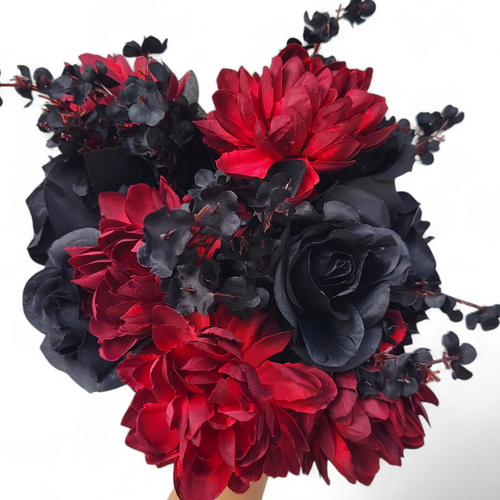 Bouquet of red and black flowers on a white background