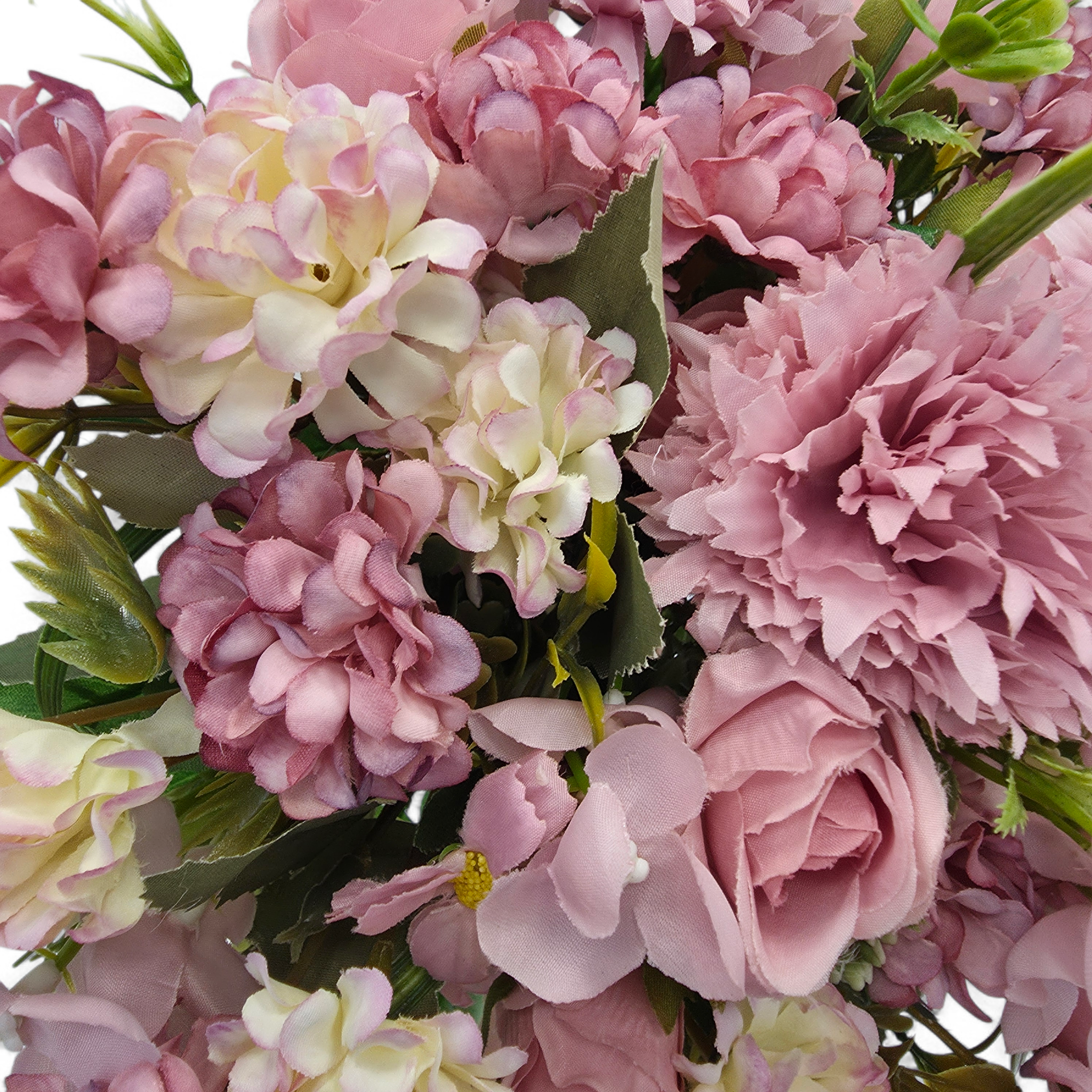 Close-up of a bouquet of pink and white flowers with green leaves.