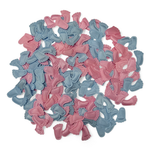 Pink and blue decorative baby footprint confetti on a white background