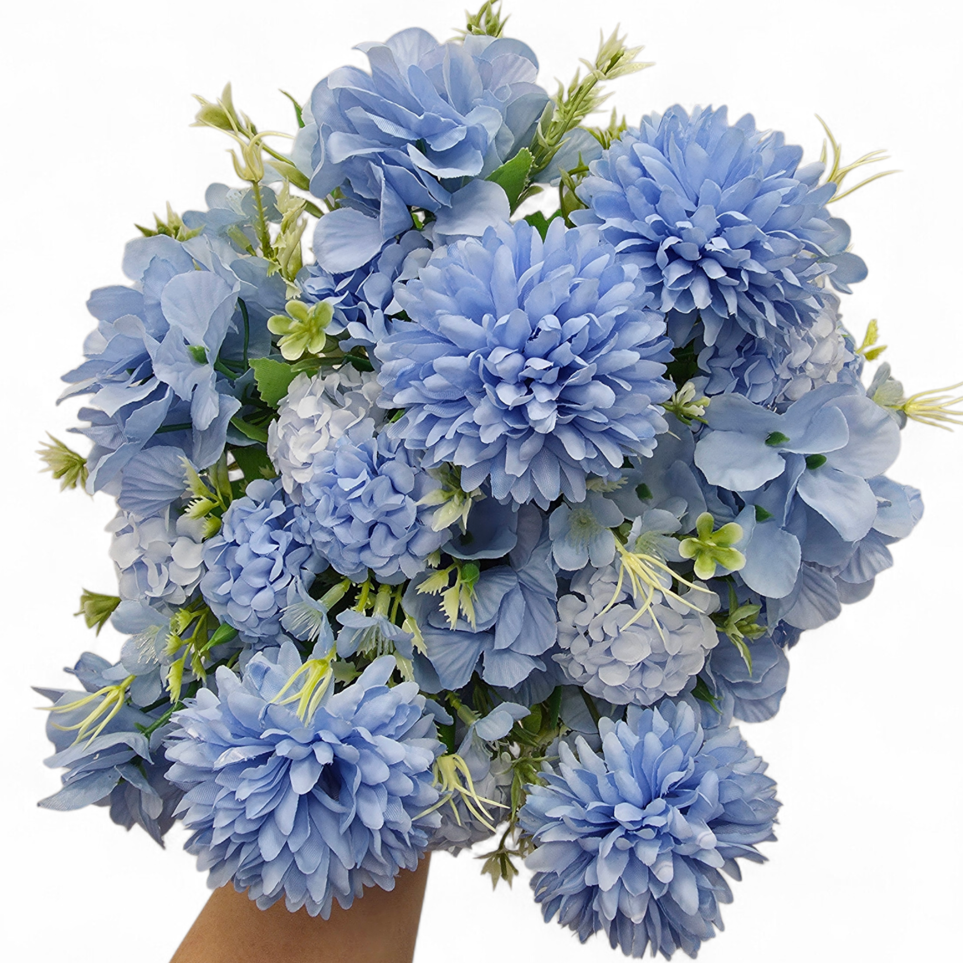 Bouquet of blue flowers held by a hand on a white background
