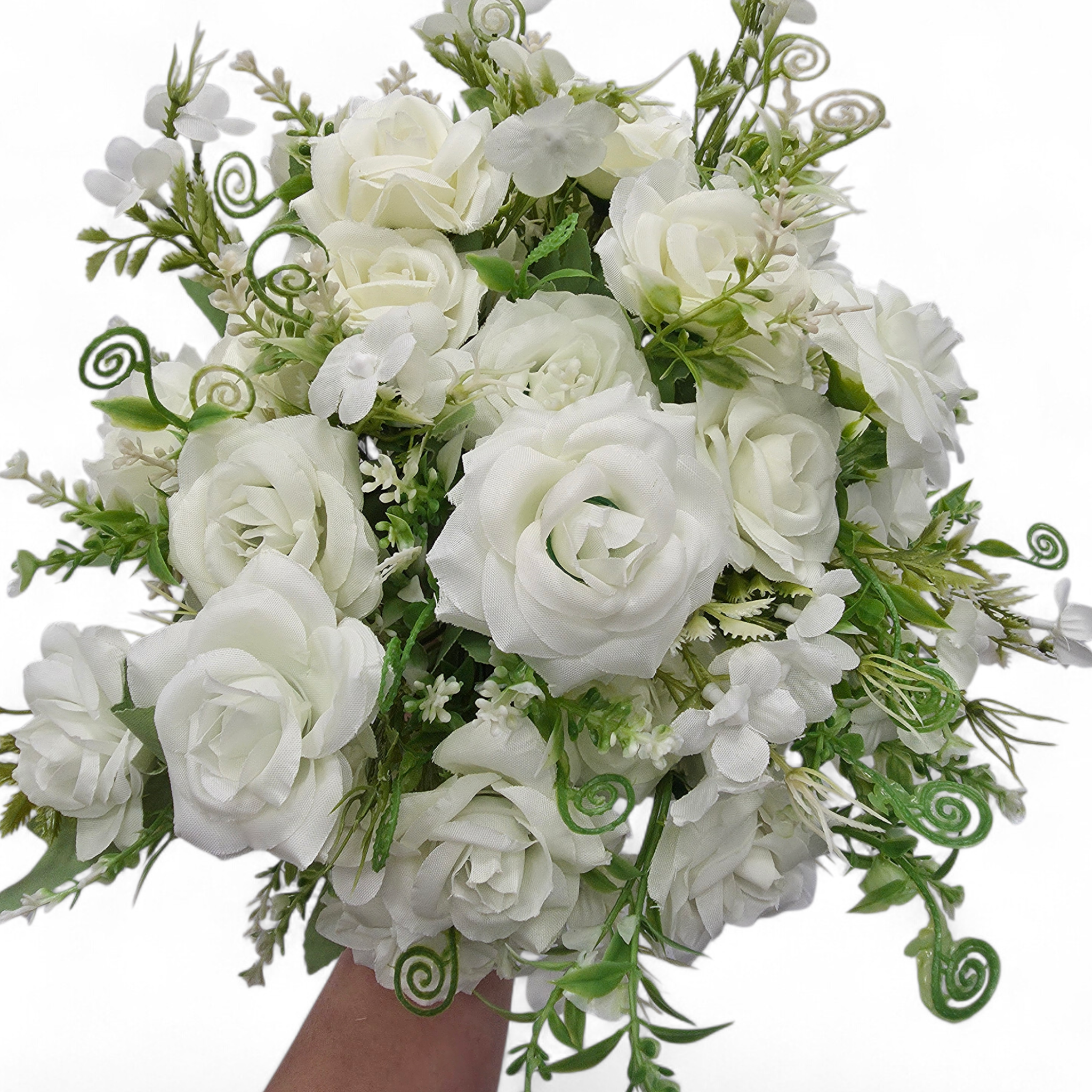 Bouquet of white roses with greenery on a white background
