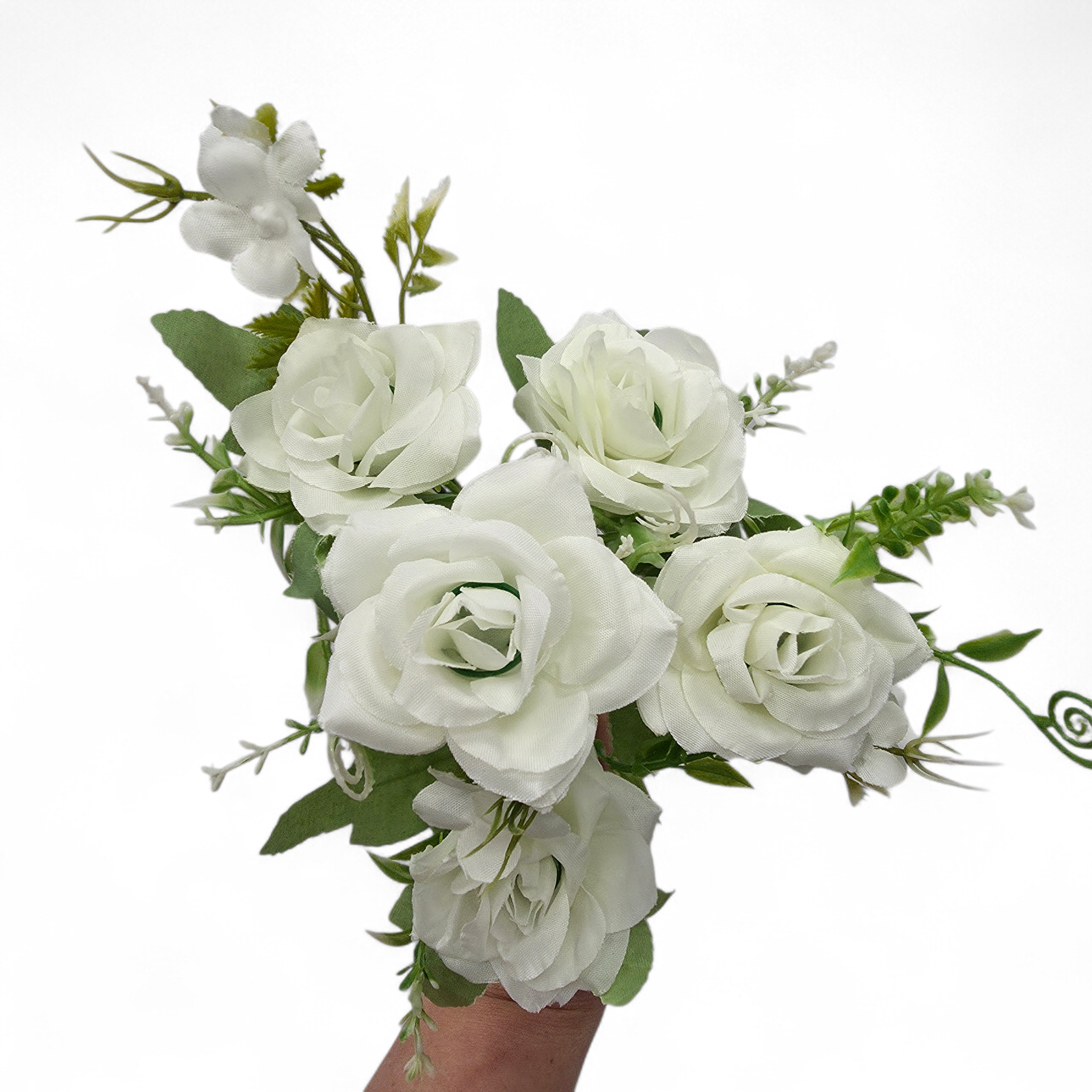 Bouquet of white roses held by a hand on a white background