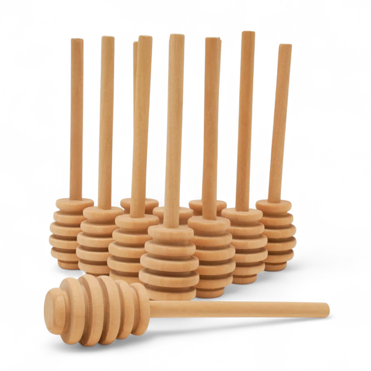 Set of wooden honey dipper sticks on a white background