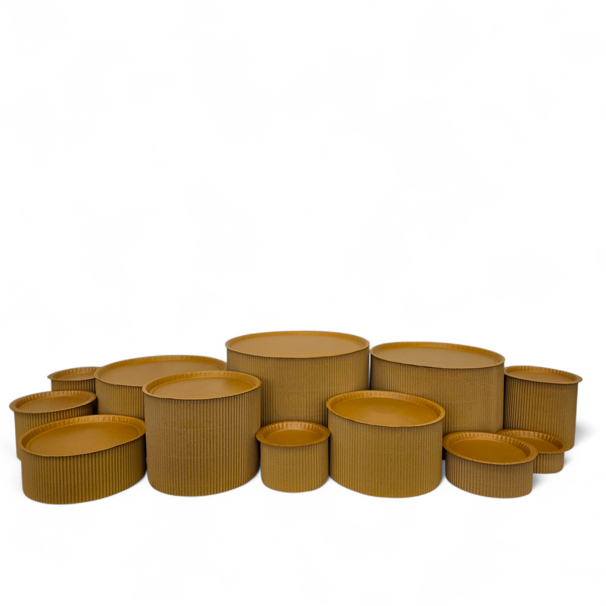 DIY grazing table kit with disposable natural kraft platters plinths front low view - grazekits