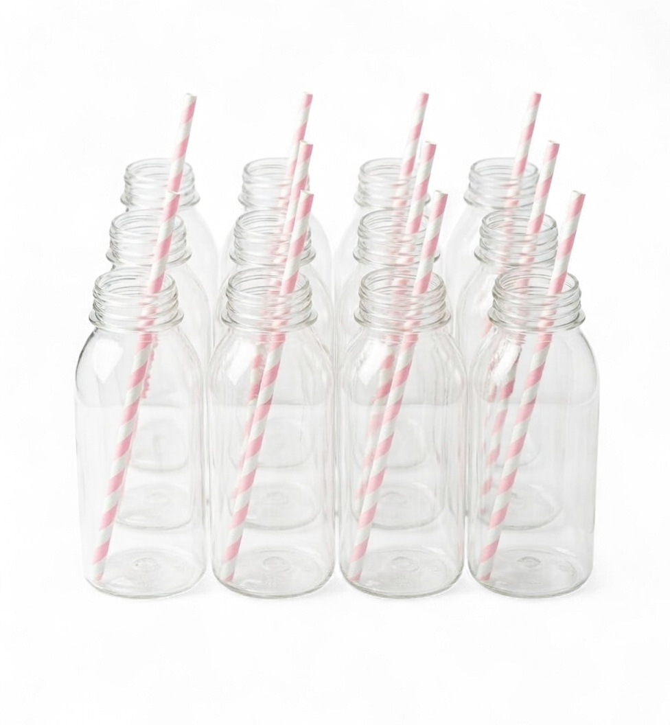 Set of 12 clear plastic bottles with light pink straws on a white background