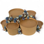 DIY grazing table kit with disposable natural platters plinths and blue steel flowers front view - grazekits