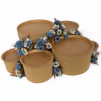 DIY grazing table kit with disposable natural platters plinths and blue steel flowers left view - grazekits