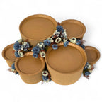 DIY grazing table kit with disposable natural platters plinths and blue steel flowers main view - grazekits