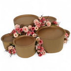 DIY grazing table kit with disposable natural platters plinths and pink steel flowers left view - grazekits