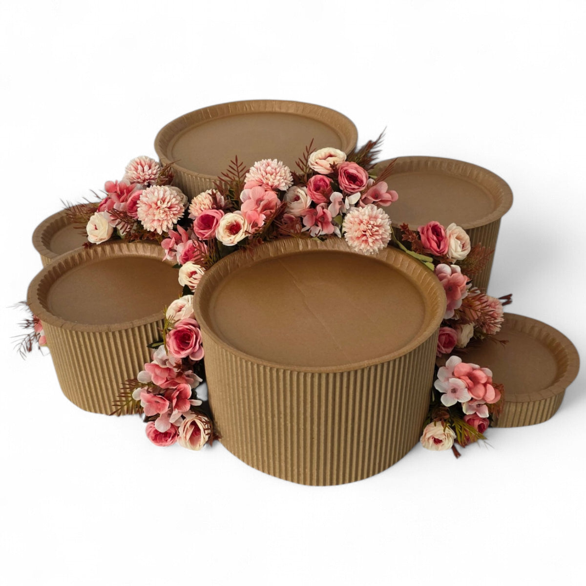 DIY grazing table kit with disposable natural platters plinths and pink steel flowers front view - grazekits