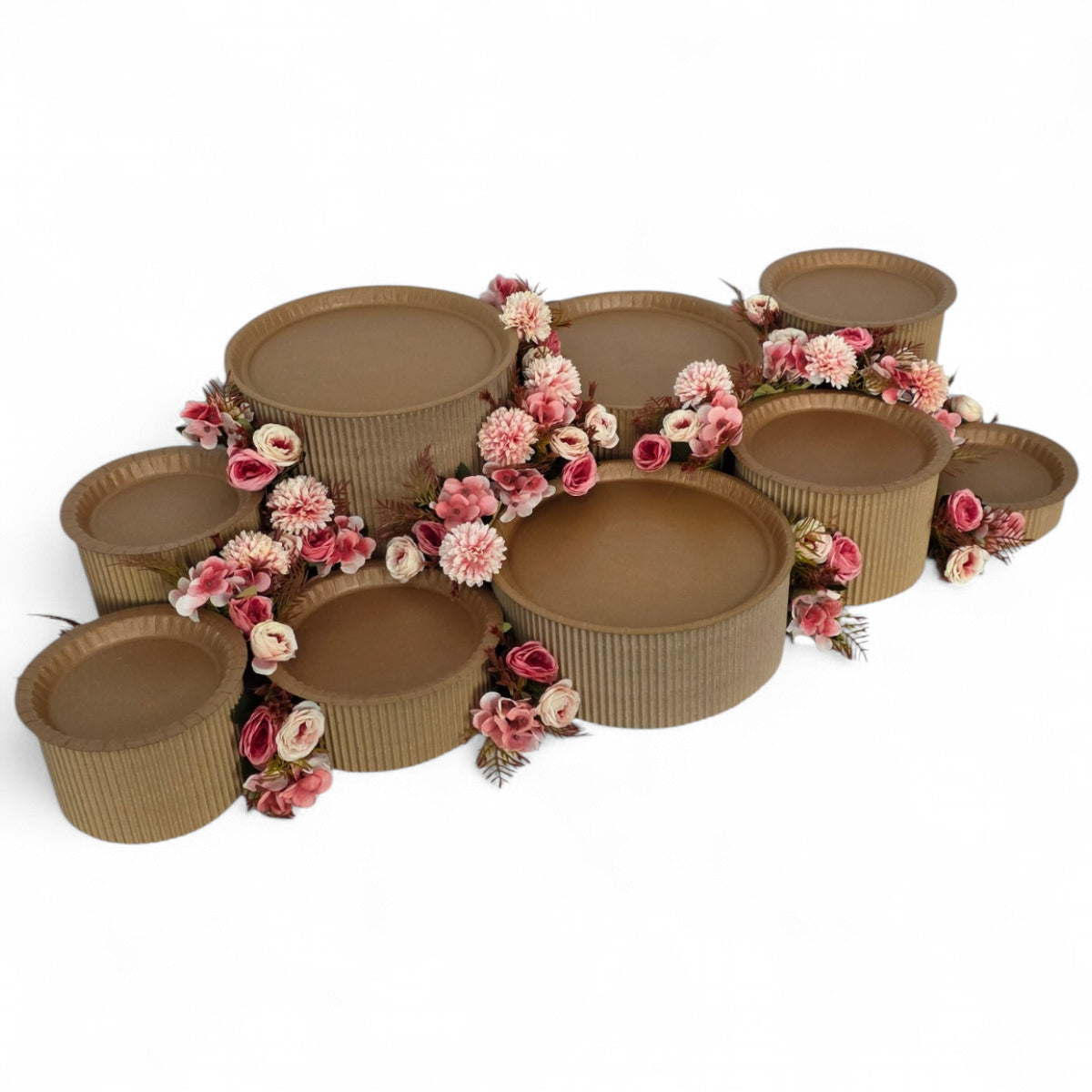 DIY grazing table kit with disposable natural platters plinths and pink steel flowers left view - grazekits