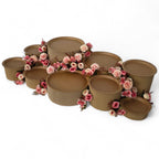 DIY grazing table kit with disposable natural platters plinths and pink steel flowers right view - grazekits