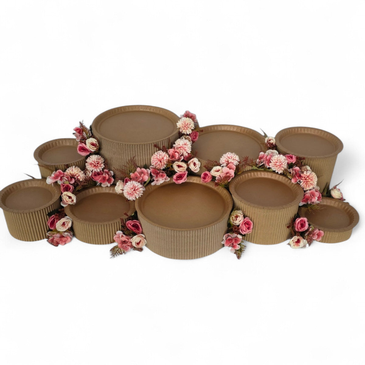 DIY grazing table kit with disposable natural platters plinths and pink steel flowers front view - grazekits