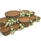 DIY grazing table kit with disposable natural platters plinths and white roses flowers left view - grazekits