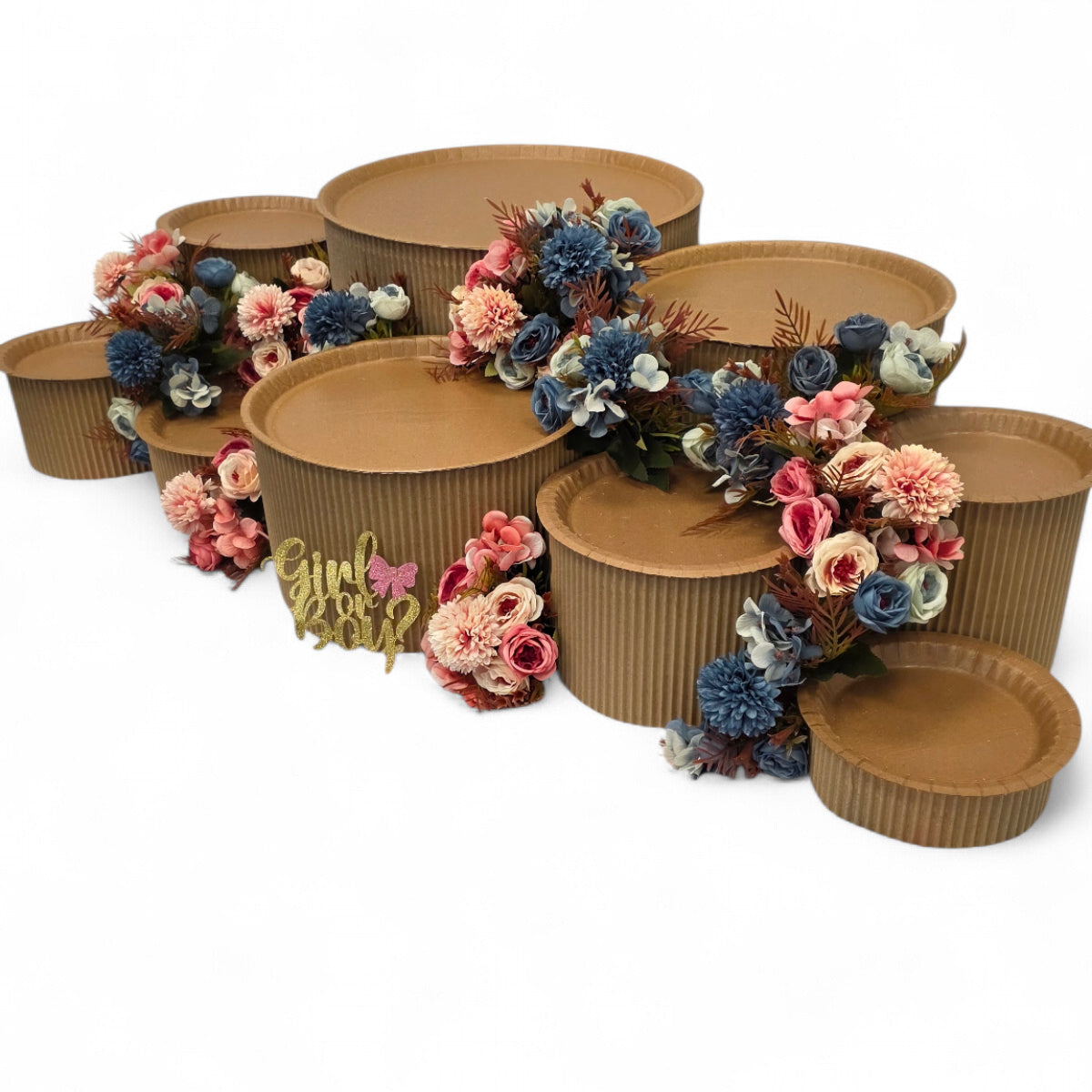 DIY grazing table kit baby shower gender reveal with disposable natural platters plinths, pink and blue flowers, baby footprint confetti and a "girl or boy?" sign right view - grazekits