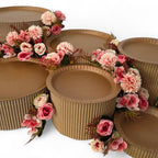 DIY grazing table kit with disposable natural platters plinths and pink steel flowers detail view - grazekits